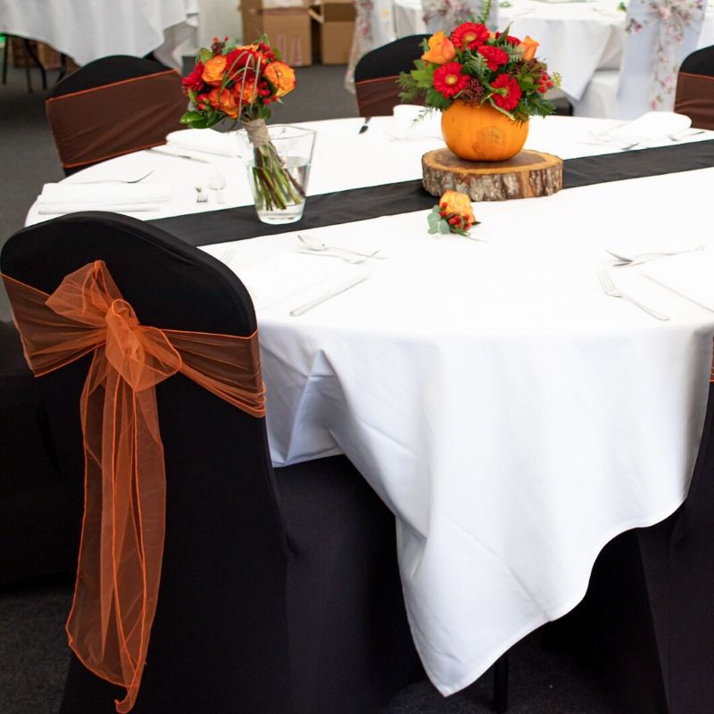 Candy Bees Chair sashes and floral table centrepieces